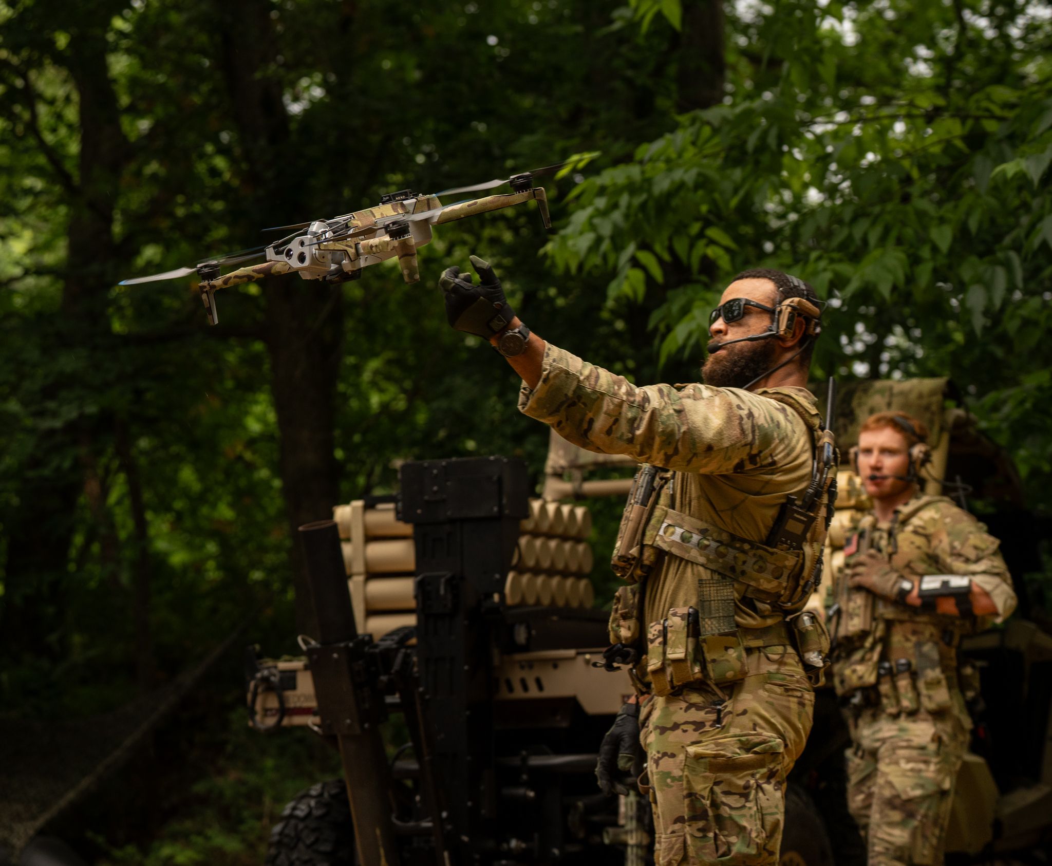 Soldier flying a Skydio ISR drone in the field