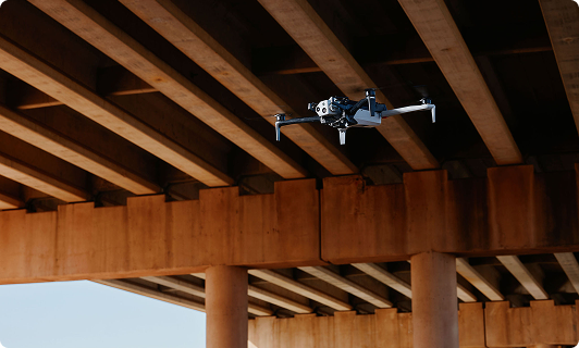 Skydio X10 Drone inspecting the concrete structure of a roadway overpass